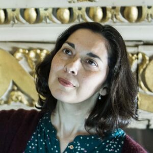 Headshot of a woman looking up