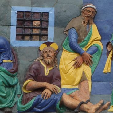 Photo of Santi Buglioni, detail of Visiting the Imprisoned (1526–1529). Glazed terracotta. Ospedale del Ceppo, Pistoia.
