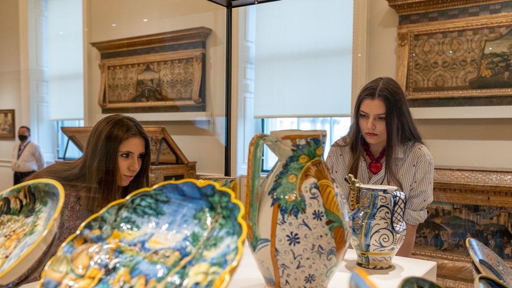 People looking at an object