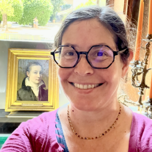 Headshot of Tanya Klowden with painted portrait of Sofonisba Anguissola